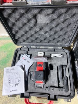 a case with tools in it sitting on the ground