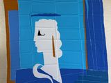 une écharpe bleue et blanche sur laquelle figure l'image d'un homme