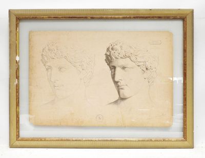 an old drawing of a man ' s head and a woman ' s head