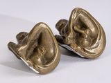 pair of bronze figurines of a man and a woman