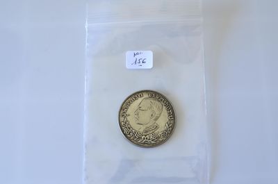 Une pièce ou médaille en métal, à rechercher