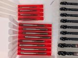 many different types of screws in a plastic case