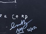 graffiti on the wall of a recording studio with a record on it