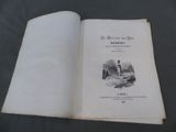 un livre ouvert sur lequel figure l'image d'un phare