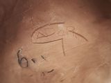 a close up of a vase with a drawing on it