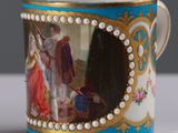a cup with a picture of a man and a woman on it