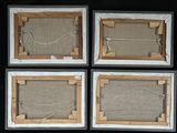 four pieces of art are displayed on a black surface