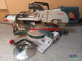 a machine that is sitting on the floor next to other tools