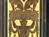 an old book with a design on the front of it