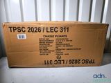 the box is sitting on the table next to the wall