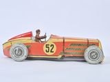 a red and yellow toy car with a man in the driver seat