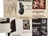 plusieurs affiches représentant divers types d'œuvres d'art, exposées sur une surface blanche