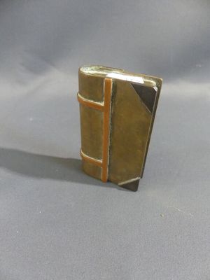 a small book that is sitting on a table