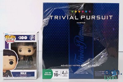 the box of the pop vinyl figure is next to the box of the pop vinyl figure