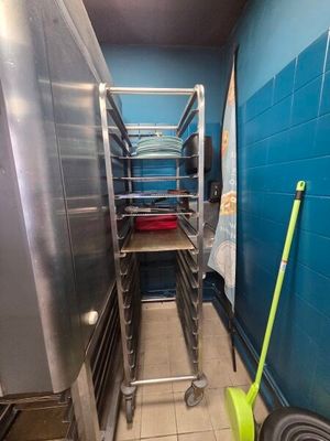an image of a kitchen with a rack of food