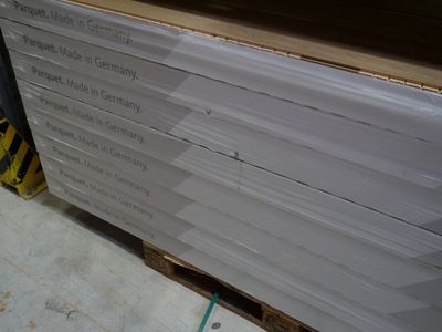 a stack of boxes that are sitting on a pallet