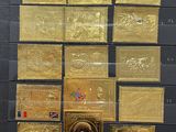 gold plated coins are displayed on a display in a museum