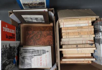 many books stacked on top of each other on a shelf