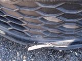 a close up of the front bumper of a car