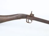 an old gun with a wooden handle on a white background