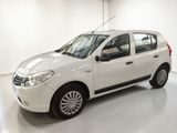 a picture of a white car parked in a garage