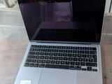 a laptop that is sitting on the floor in the room