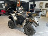 an image of a four wheeler atv in a garage