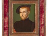portrait of a man with a red beard and a black hat