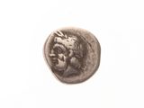 l'image d'une pièce de monnaie sur laquelle figure le portrait d'un homme