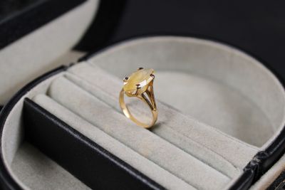 a ring that is sitting in a box with a ring in it