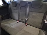 two seats in the back of a car that are empty