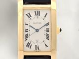 an image of a gold wrist watch with roman numerals on the face