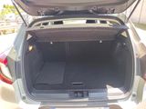 a trunk of a car with the back door open