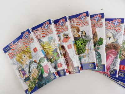 Six mangas mettant en scène des princesses de contes de fées sont alignés sur une surface blanche