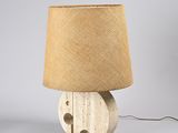 an image of a wooden lamp with a burlock shade on top of it