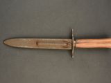 a knife that is laying on a table