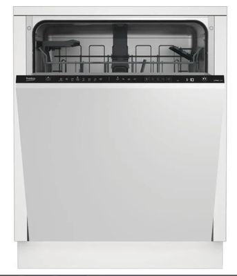 un lave-vaisselle blanc posé sur un comptoir blanc