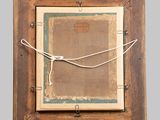 an old picture frame with a rope hanging from it ' s side