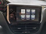 a picture of a car dashboard with a display on it