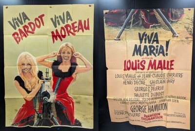 two posters of women in red dresses are hanging on a wall