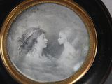 a picture of a woman and a child in a picture frame