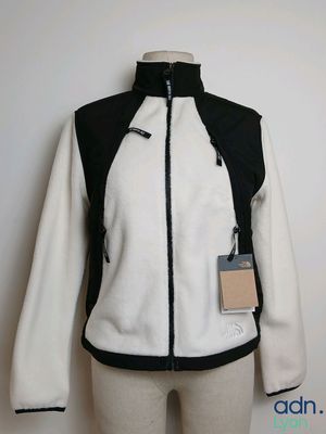 women ' s white and black jacket on mannequin mannequin mannequin mannequin mannequin mannequin mannequin mannequin