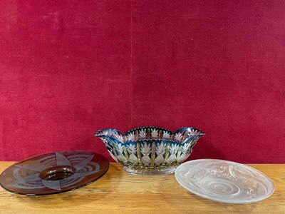 two bowls on a table with a red background