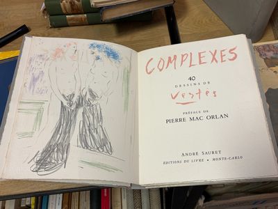 un livre ouvert sur lequel est dessiné un arbre