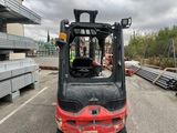 a forklift that is parked in a parking lot