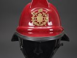 fireman ' s helmet on a mannequin head on a black mannequin
