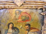 une peinture sur le mur d'un immeuble représentant un homme et une femme