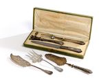 a box with silverware in it and a knife and fork