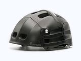a helmet that is sitting on a white surface