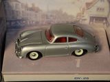 a toy car that is in a box on a table